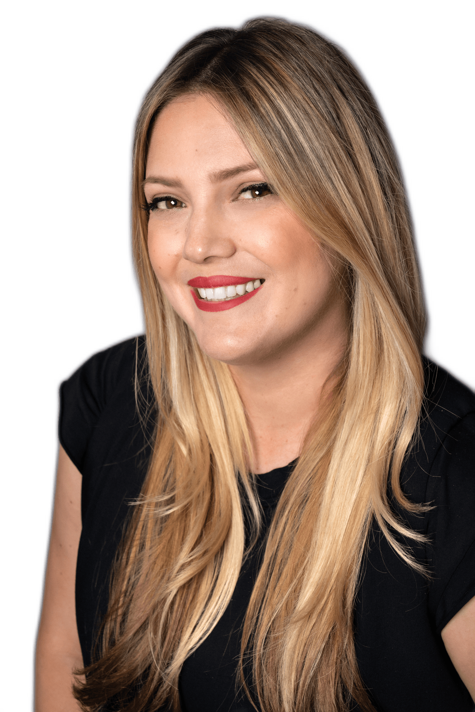 irine is smiling at the camera wearing red lipstick, dark blonde hair, and a black blazer